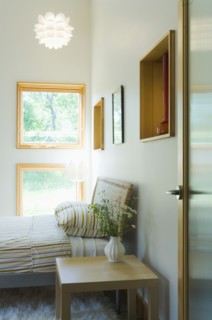 View through doorway into modern bedroom