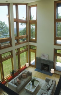 High angle view contemporary living room with several windows