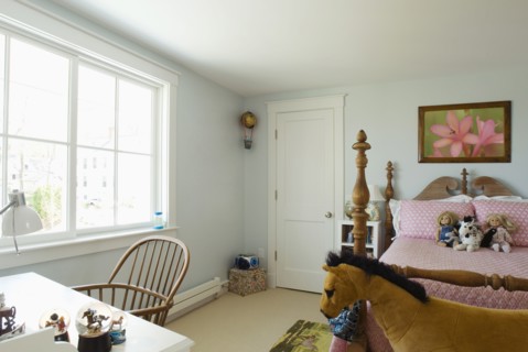 Girls bedroom with post bed