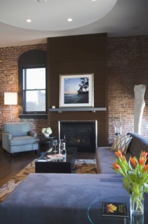 Contemporary living room with brick wall