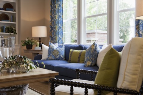 Cropped couch with coffee table in the living room at home