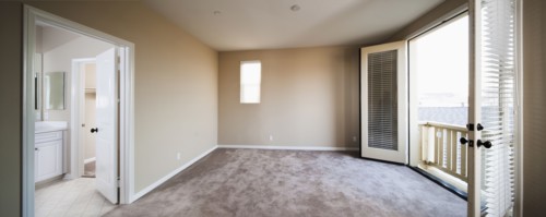Empty room with outdoor view through balcony at Ontario
