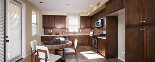 Kitchen with brown cabinets at home