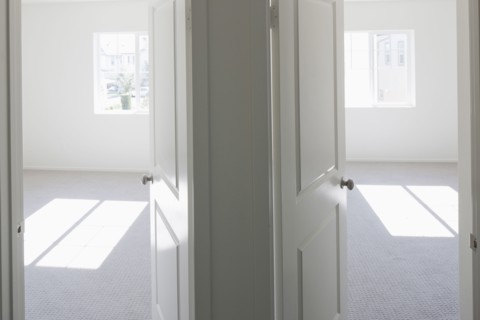 House with empty rooms and open doors