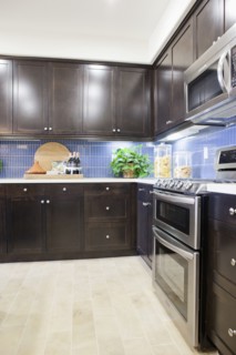 Kitchen with brown cabinets at home