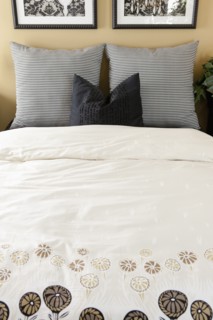 Duvet and pillows on bed