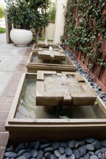 Fountains outside house
