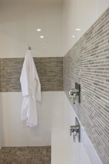Bathrobe hanging in domestic bathroom