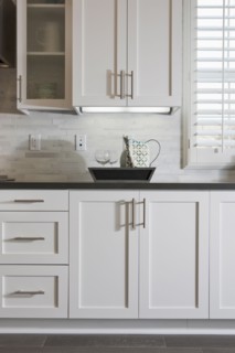 White cabinets and tray in domestic kitchen