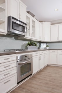 Appliances and gas stove in domestic kitchen