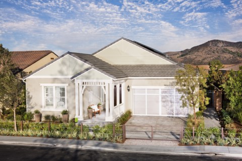 Exterior of a one story house with garage
