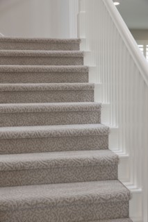 Close-up of stairs with banister at home