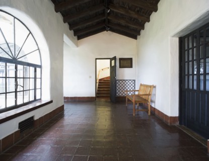 Bench in hallway outside staircase