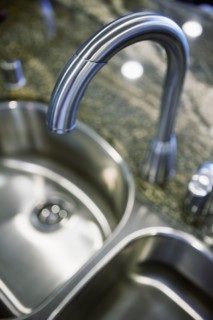 Gooseneck faucet above kitchen sink
