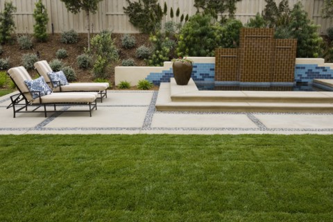 Back patio with contemporary fountain