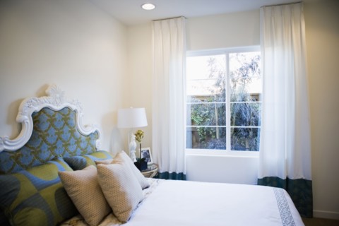 Decorative headboard in contemporary bedroom