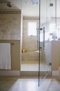 Open glass door to walk in shower