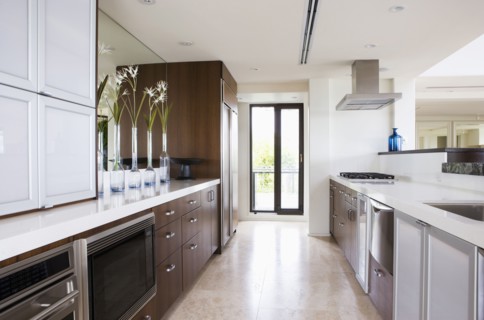 Clean contemporary kitchen with wooden cabinets