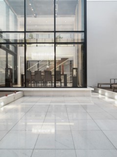 Exterior modern home with glass walls