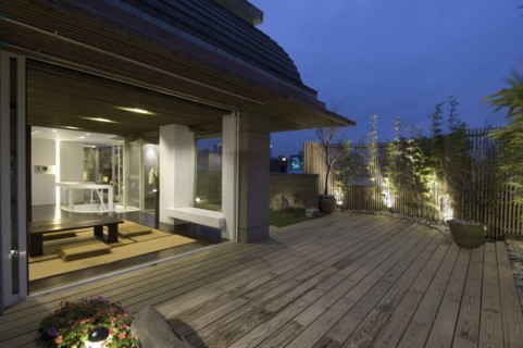 Oriental dining room open to outdoor deck