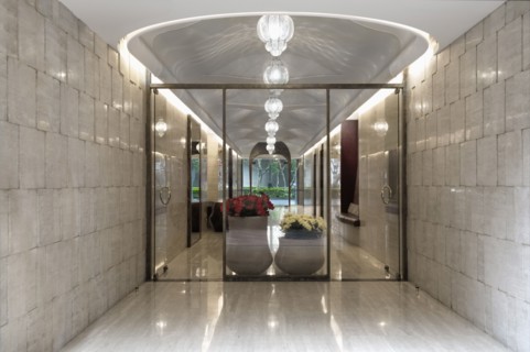 Detail double glass doors with large flower pots