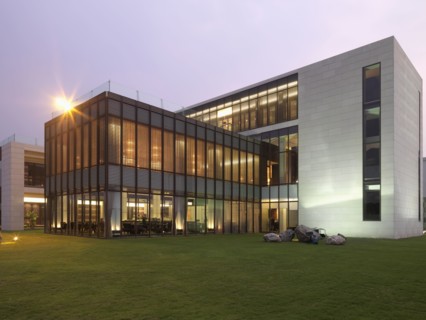 Exterior view modern building with all glass dining room