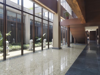 Modern marble hallway along side water