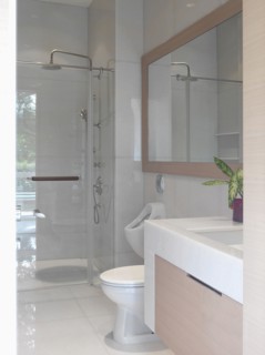 Small modern bathroom with glass shower