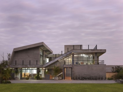 Front exterior modern home at sunset