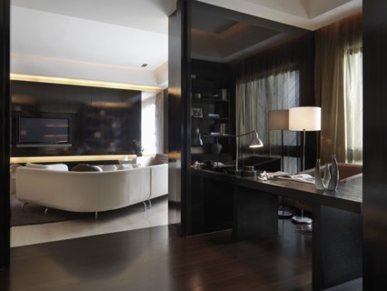Modern home office off of living room