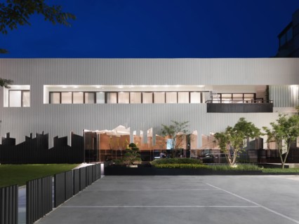 Front elevation of modern building at dusk