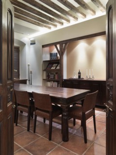 Opening wooden doors leading to dining room
