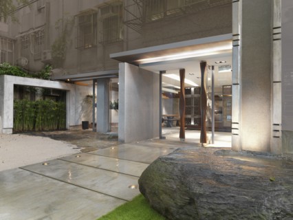 Modern fountain outside entrance to home