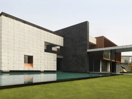 Infinity pool outside of modern building