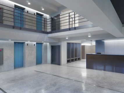 Open lobby with blue elevators