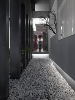 Gray stones along modern building