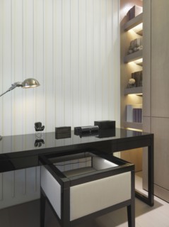 Small home desk with modern armchair