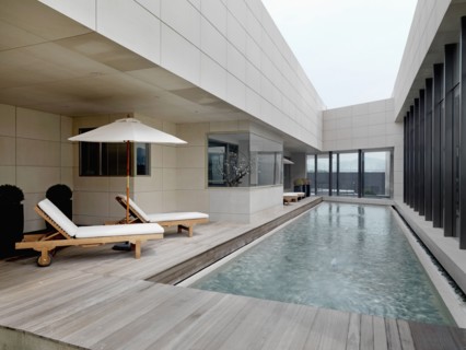 Wading pool and lounge chairs