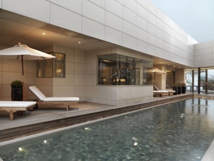 Wading pool and lounge chairs