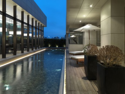 Wading pool and lounge chairs