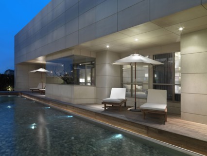 Wading pool and lounge chairs