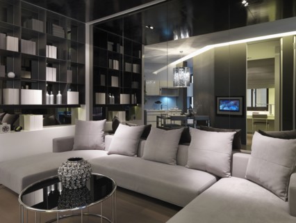 Modern sectional sofa in front of mirror