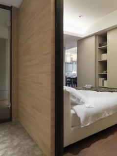 Wooden wall behind bed