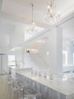 Marble dining area connected to kitchen