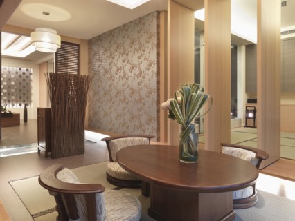 Contemporary dining room table in asian dining room