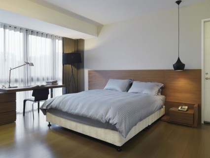 Small modern bedroom with desk