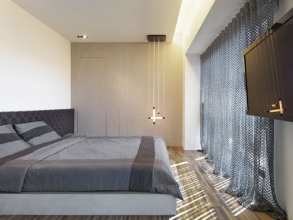 Dark colored bedspread on modern bed