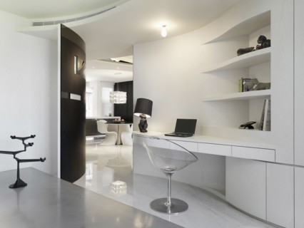 Modern style desk with bunny lamp and clear chair