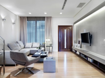 Living room with flatscreen tv in modern home