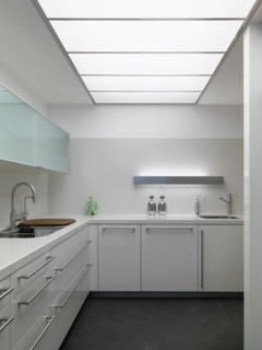 Modern white kitchen in minimalistic home